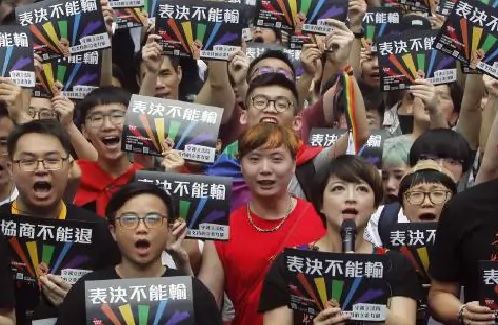 Taiwan's parliament approves same-sex marriage