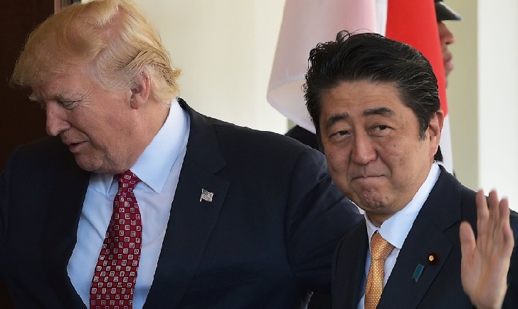 Trump breaks with Abe, says not bothered by NK missile tests