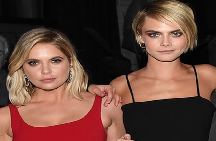 Cara Delevingne has confirmed that she has been in a relationship with Ashley Benson for a year.