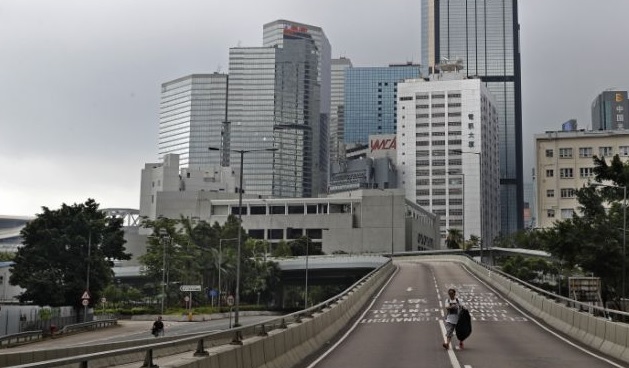 Hong Kong police clear streets as protesters move to park