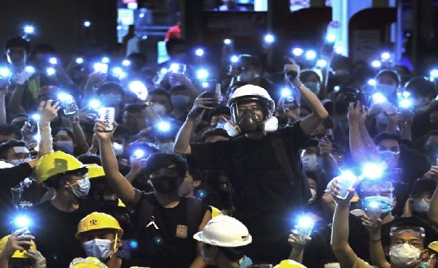 Hong Kong protesters end blockade of police headquarters