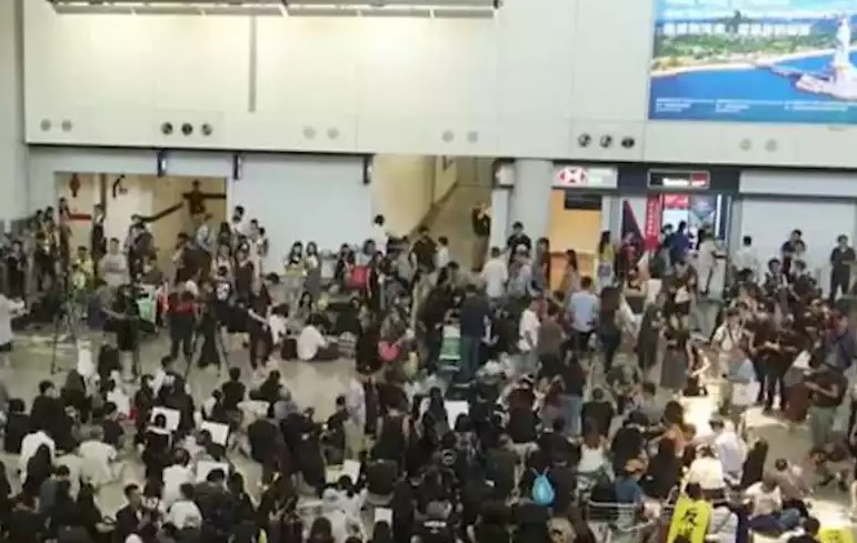 New airport protest as HK leader warns of 'path of no return'