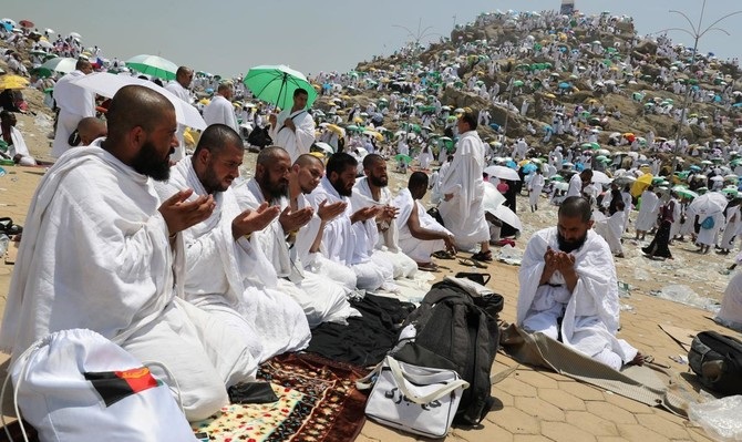 Muslim hajj pilgrims ascend Mount Arafat for day of worship