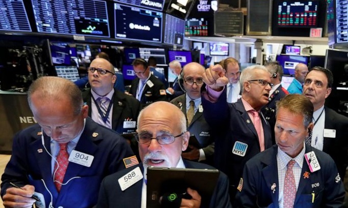 Wall Street scuffles as worsening pandemic slows its rally