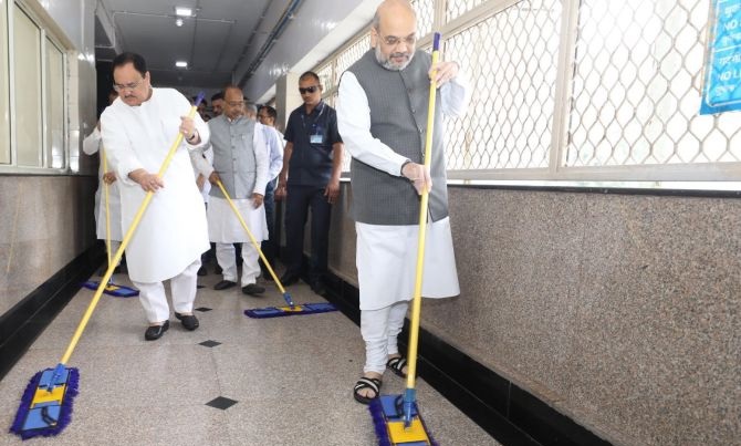 Amit Shah and BJP leaders mop floor at AIIMS as part of 'seva saptah'