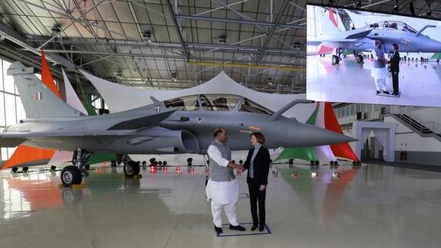 Defence Minister Rajnath Singh receives IAF's first Rafale fighter jet from France