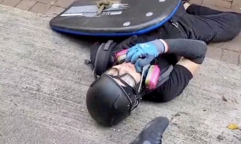 Hong Kong student protester shot by police to be charged