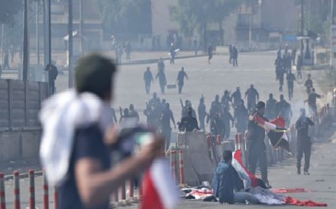 Iraqi police fire shots, tear gas at protesters; 23 killed