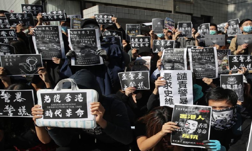 Hong Kong protesters call for city-wide vigils after student dies