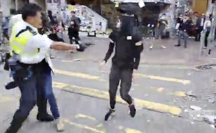 Hong Kong police shoot protester, man set on fire