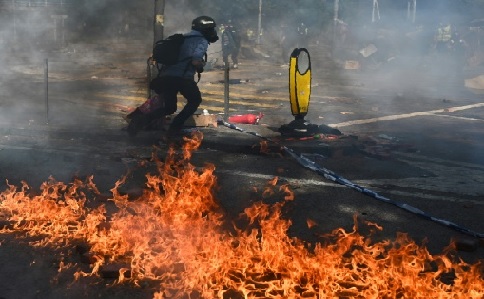 Hong Kong protesters clash with police at key campus battleground