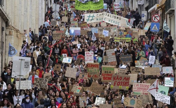 Tens of thousands rally in Europe, Asia before UN climate summit