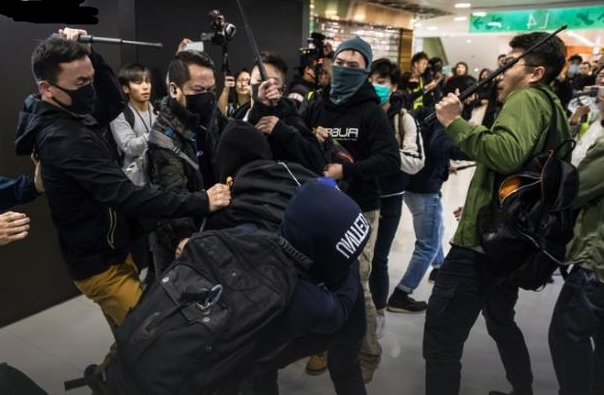 Hong Kong police arrest 15 in fresh shopping mall protests