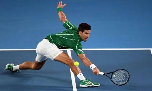 Djokovic survives scare as rain causes chaos at Australian Open