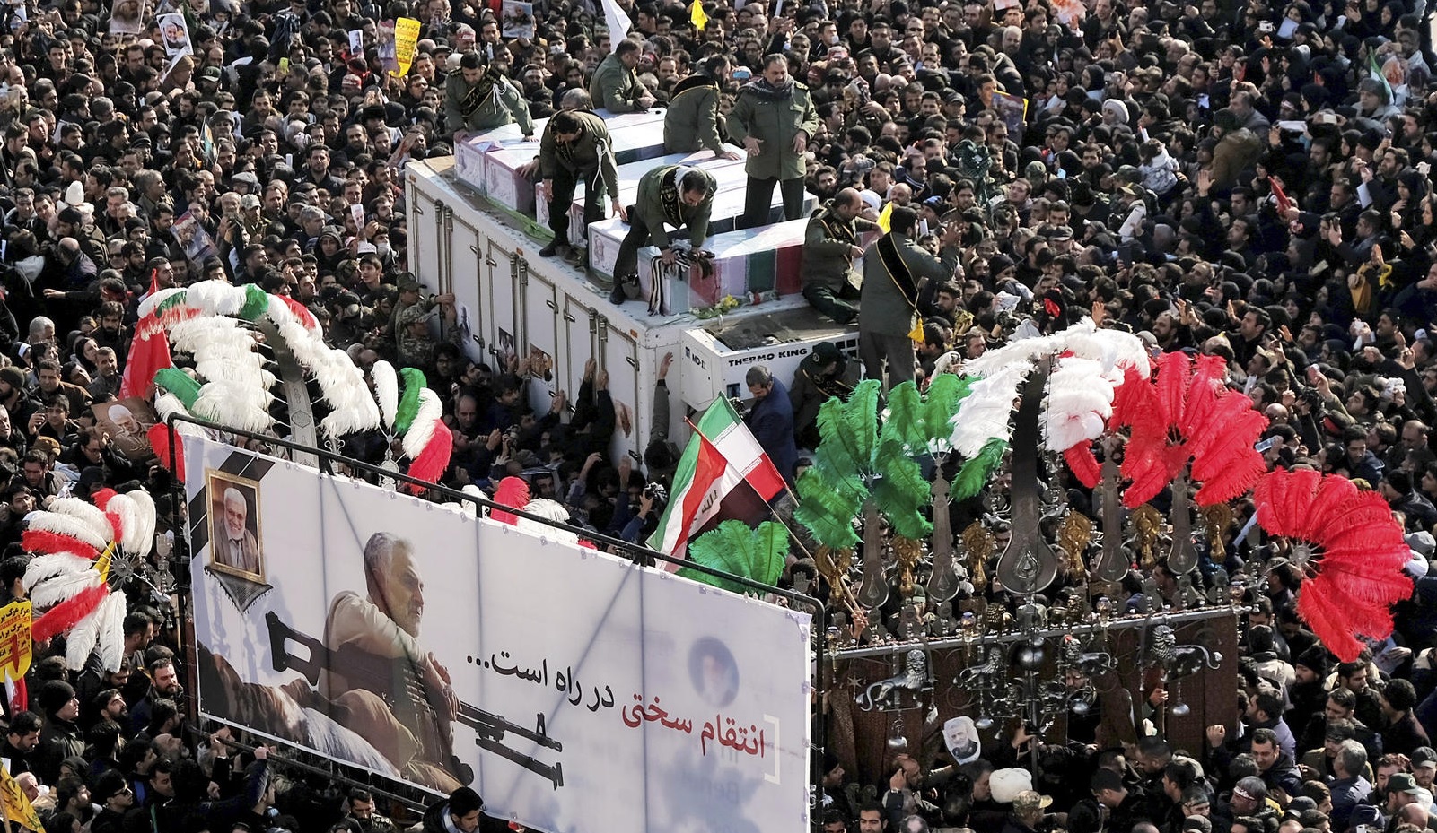 Huge crowds in Iran mourn general killed by US drone