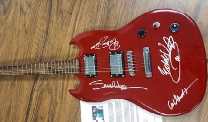 Guitars signed by rock stars taken from Florida storage unit