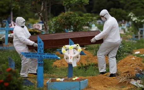 At funerals in virus outbreak, mourning is from a distance