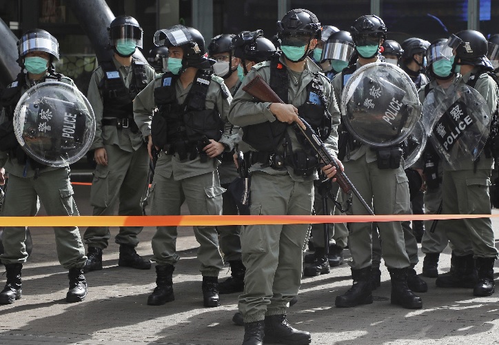 Hong Kong police use pepper spray to clear May Day protest